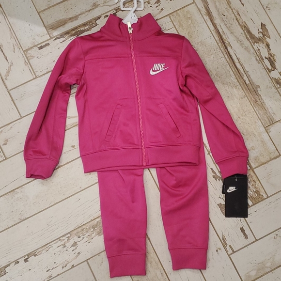 hot pink nike tracksuit
